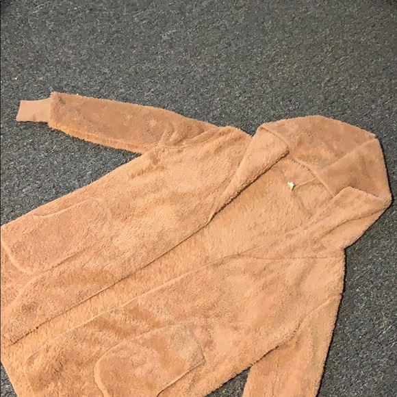 Fuzzy brown sweater runs small this ones a medium - Picture 2 of 4